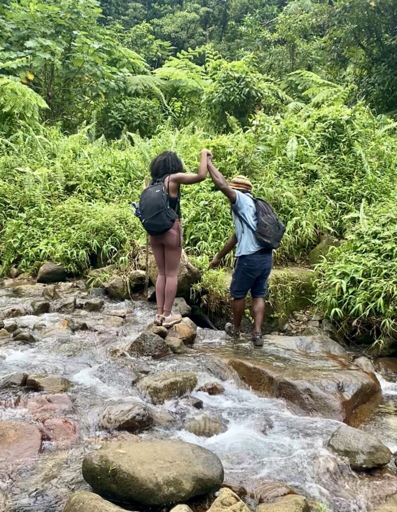 crossing the breakfast  river during the boiling lake hike in Dominica