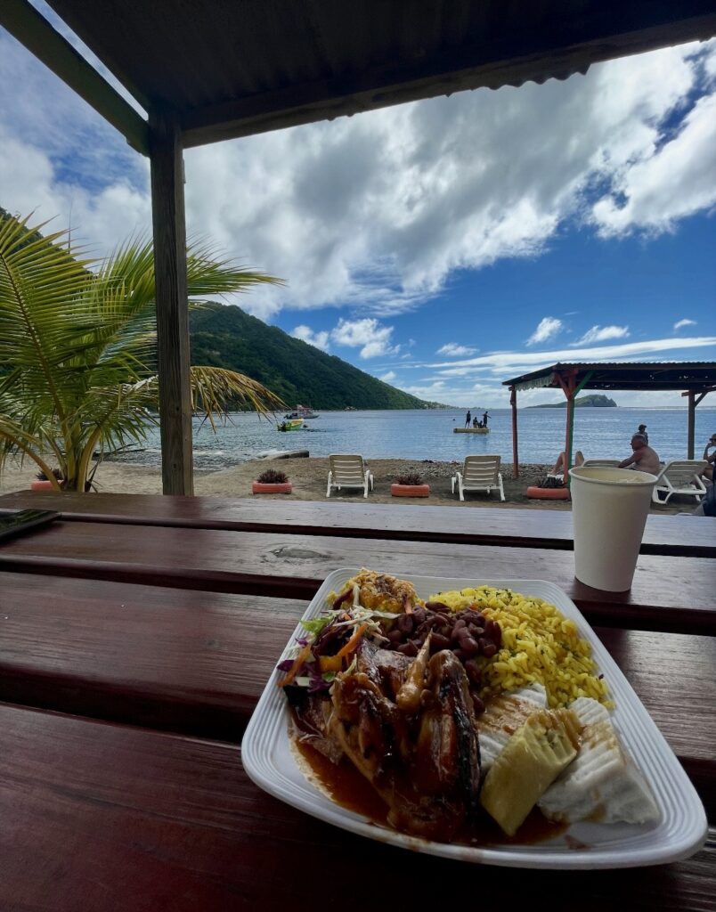 enjoying lunch at soufriere beach in Dominica